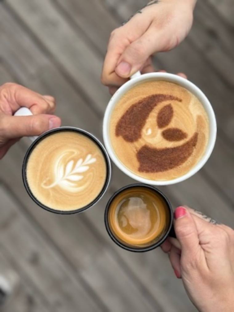 Three lattes with Apocalypse latte art