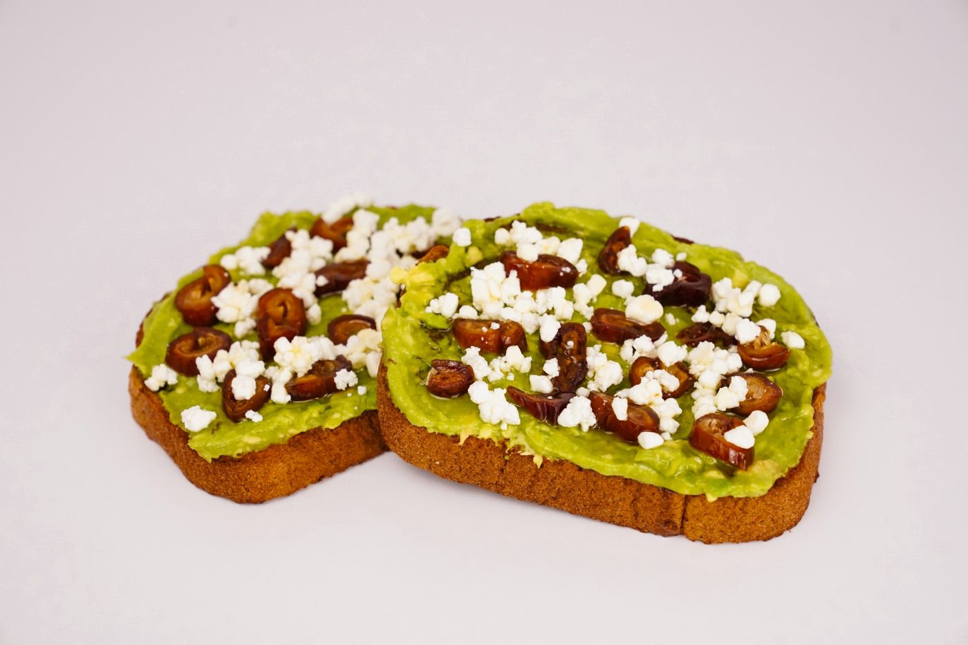Avocado toast with dates and feta